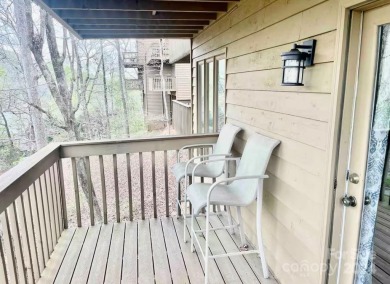 Recently renovated townhome with a bright, modern and open floor on Rumbling Bald Resort on Lake Lure in North Carolina - for sale on GolfHomes.com, golf home, golf lot