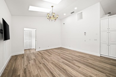 Elegantly and completely remodeled estate home with expansive on PGA National Golf Club in Florida - for sale on GolfHomes.com, golf home, golf lot