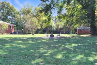 Adorable 3 bedroom home located on a large corner lot within on Mayfield-Graves Country Club in Kentucky - for sale on GolfHomes.com, golf home, golf lot