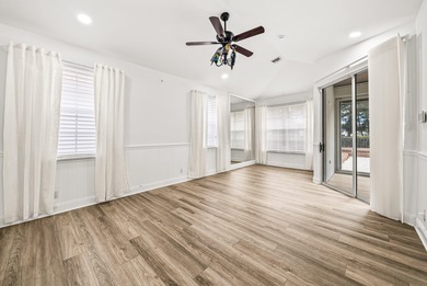 Elegantly and completely remodeled estate home with expansive on PGA National Golf Club in Florida - for sale on GolfHomes.com, golf home, golf lot