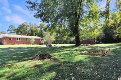 Adorable 3 bedroom home located on a large corner lot within on Mayfield-Graves Country Club in Kentucky - for sale on GolfHomes.com, golf home, golf lot