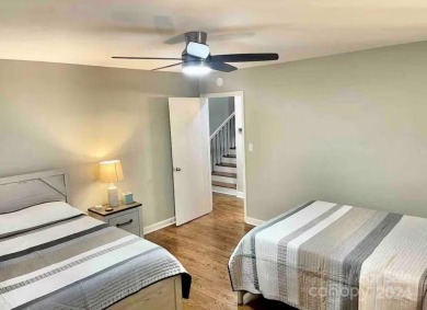 Recently renovated townhome with a bright, modern and open floor on Rumbling Bald Resort on Lake Lure in North Carolina - for sale on GolfHomes.com, golf home, golf lot