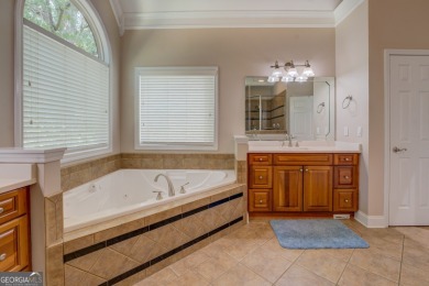 This stunning home offers the perfect blend of elegance, comfort on Indian Creek Golf Club in Georgia - for sale on GolfHomes.com, golf home, golf lot