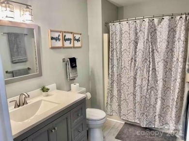 Recently renovated townhome with a bright, modern and open floor on Rumbling Bald Resort on Lake Lure in North Carolina - for sale on GolfHomes.com, golf home, golf lot