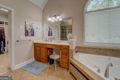 This stunning home offers the perfect blend of elegance, comfort on Indian Creek Golf Club in Georgia - for sale on GolfHomes.com, golf home, golf lot