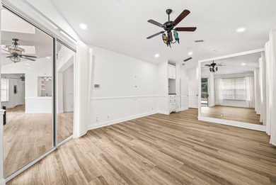 Elegantly and completely remodeled estate home with expansive on PGA National Golf Club in Florida - for sale on GolfHomes.com, golf home, golf lot