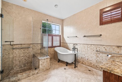 Elegantly and completely remodeled estate home with expansive on PGA National Golf Club in Florida - for sale on GolfHomes.com, golf home, golf lot