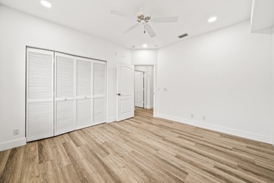 Elegantly and completely remodeled estate home with expansive on PGA National Golf Club in Florida - for sale on GolfHomes.com, golf home, golf lot