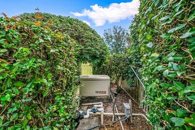 Elegantly and completely remodeled estate home with expansive on PGA National Golf Club in Florida - for sale on GolfHomes.com, golf home, golf lot