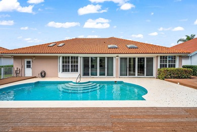 Elegantly and completely remodeled estate home with expansive on PGA National Golf Club in Florida - for sale on GolfHomes.com, golf home, golf lot
