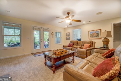 This stunning home offers the perfect blend of elegance, comfort on Indian Creek Golf Club in Georgia - for sale on GolfHomes.com, golf home, golf lot