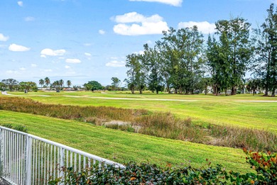 Elegantly and completely remodeled estate home with expansive on PGA National Golf Club in Florida - for sale on GolfHomes.com, golf home, golf lot