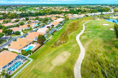 Elegantly and completely remodeled estate home with expansive on PGA National Golf Club in Florida - for sale on GolfHomes.com, golf home, golf lot