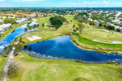 Elegantly and completely remodeled estate home with expansive on PGA National Golf Club in Florida - for sale on GolfHomes.com, golf home, golf lot