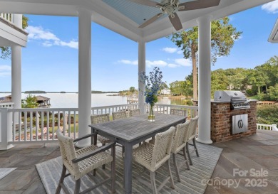 An exquisite lakefront property offering the perfect blend of on The Peninsula Club in North Carolina - for sale on GolfHomes.com, golf home, golf lot
