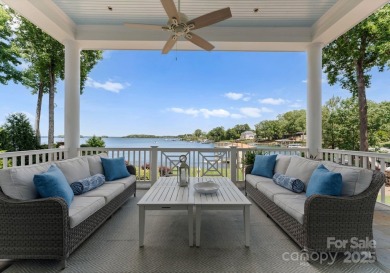 An exquisite lakefront property offering the perfect blend of on The Peninsula Club in North Carolina - for sale on GolfHomes.com, golf home, golf lot