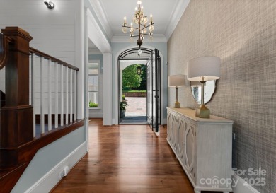 An exquisite lakefront property offering the perfect blend of on The Peninsula Club in North Carolina - for sale on GolfHomes.com, golf home, golf lot