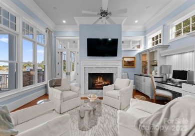 An exquisite lakefront property offering the perfect blend of on The Peninsula Club in North Carolina - for sale on GolfHomes.com, golf home, golf lot