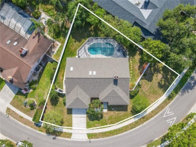 Beautifully maintained 3-bedroom, 2-bath pool home in the on East Lake Woodlands Country Club in Florida - for sale on GolfHomes.com, golf home, golf lot