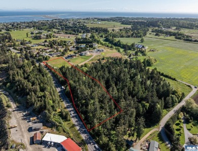 Beautiful parcel up Cays Rd. amongst gorgeous estate homes on on The Cedars At Dungeness in Washington - for sale on GolfHomes.com, golf home, golf lot