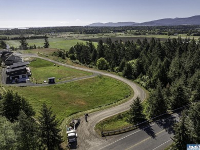 Beautiful parcel up Cays Rd. amongst gorgeous estate homes on on The Cedars At Dungeness in Washington - for sale on GolfHomes.com, golf home, golf lot