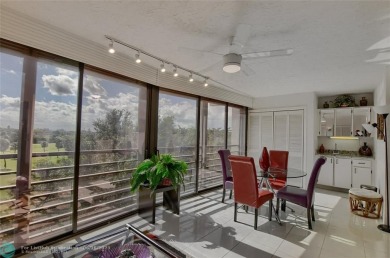 DONT MISS OUT ON THIS STUNNING RENOVATED 1900 SQ FT CORNER on Boca Dunes Golf and Country Club in Florida - for sale on GolfHomes.com, golf home, golf lot