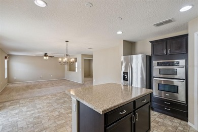 (ROOF INSPECTED, HVAC 2021, DISHWASHER 2025, WATER HEATER on Reunion Resort Golf Course in Florida - for sale on GolfHomes.com, golf home, golf lot