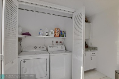DONT MISS OUT ON THIS STUNNING RENOVATED 1900 SQ FT CORNER on Boca Dunes Golf and Country Club in Florida - for sale on GolfHomes.com, golf home, golf lot