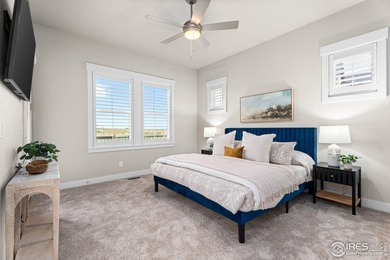 Experience maintenance-free living in Harmony Club w/ golf on Harmony Golf Club in Colorado - for sale on GolfHomes.com, golf home, golf lot