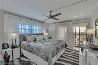 DONT MISS OUT ON THIS STUNNING RENOVATED 1900 SQ FT CORNER on Boca Dunes Golf and Country Club in Florida - for sale on GolfHomes.com, golf home, golf lot