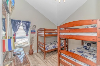 This spacious 5 Bedroom 3 Bath raised beach house is just a very on Prestwick Country Club in South Carolina - for sale on GolfHomes.com, golf home, golf lot