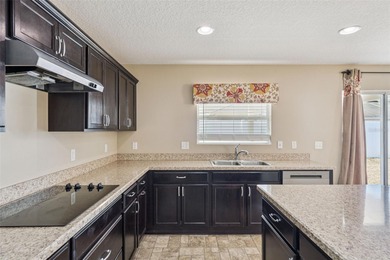 (ROOF INSPECTED, HVAC 2021, DISHWASHER 2025, WATER HEATER on Reunion Resort Golf Course in Florida - for sale on GolfHomes.com, golf home, golf lot