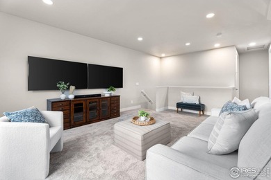 Experience maintenance-free living in Harmony Club w/ golf on Harmony Golf Club in Colorado - for sale on GolfHomes.com, golf home, golf lot