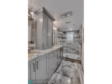 DONT MISS OUT ON THIS STUNNING RENOVATED 1900 SQ FT CORNER on Boca Dunes Golf and Country Club in Florida - for sale on GolfHomes.com, golf home, golf lot