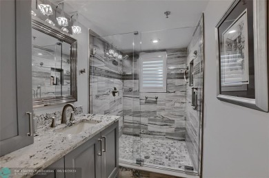 DONT MISS OUT ON THIS STUNNING RENOVATED 1900 SQ FT CORNER on Boca Dunes Golf and Country Club in Florida - for sale on GolfHomes.com, golf home, golf lot
