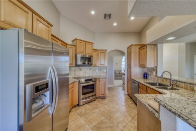 Welcome to desert living! This elegant 4-bedroom, 2-bathroom on Los Lagos Golf Club in Arizona - for sale on GolfHomes.com, golf home, golf lot