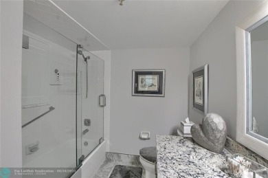 DONT MISS OUT ON THIS STUNNING RENOVATED 1900 SQ FT CORNER on Boca Dunes Golf and Country Club in Florida - for sale on GolfHomes.com, golf home, golf lot