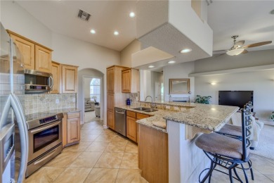 Welcome to desert living! This elegant 4-bedroom, 2-bathroom on Los Lagos Golf Club in Arizona - for sale on GolfHomes.com, golf home, golf lot
