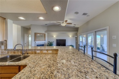 Welcome to desert living! This elegant 4-bedroom, 2-bathroom on Los Lagos Golf Club in Arizona - for sale on GolfHomes.com, golf home, golf lot