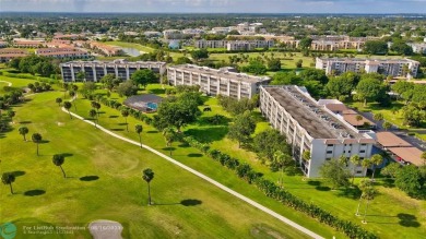 DONT MISS OUT ON THIS STUNNING RENOVATED 1900 SQ FT CORNER on Boca Dunes Golf and Country Club in Florida - for sale on GolfHomes.com, golf home, golf lot