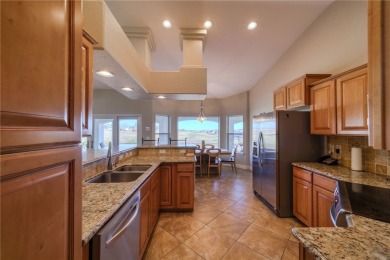 Welcome to desert living! This elegant 4-bedroom, 2-bathroom on Los Lagos Golf Club in Arizona - for sale on GolfHomes.com, golf home, golf lot