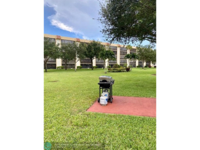 DONT MISS OUT ON THIS STUNNING RENOVATED 1900 SQ FT CORNER on Boca Dunes Golf and Country Club in Florida - for sale on GolfHomes.com, golf home, golf lot