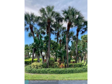 DONT MISS OUT ON THIS STUNNING RENOVATED 1900 SQ FT CORNER on Boca Dunes Golf and Country Club in Florida - for sale on GolfHomes.com, golf home, golf lot