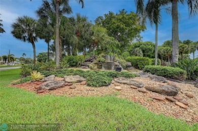 DONT MISS OUT ON THIS STUNNING RENOVATED 1900 SQ FT CORNER on Boca Dunes Golf and Country Club in Florida - for sale on GolfHomes.com, golf home, golf lot