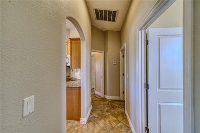 Welcome to desert living! This elegant 4-bedroom, 2-bathroom on Los Lagos Golf Club in Arizona - for sale on GolfHomes.com, golf home, golf lot