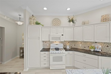 Welcome Home to this Exquisite Golf-Front Home with Saltwater on The Links of Spruce Creek in Florida - for sale on GolfHomes.com, golf home, golf lot