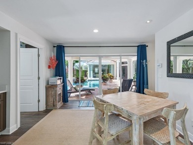 Step into a world where luxury meets tranquility in this on Bonita Bay West in Florida - for sale on GolfHomes.com, golf home, golf lot