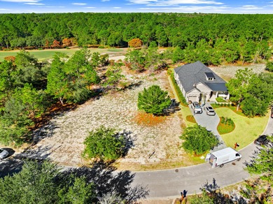 Located within the gated community of Wild Heron, this on Sharks Tooth Golf Club in Florida - for sale on GolfHomes.com, golf home, golf lot