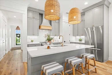 Welcome to 133 E Firethorn Circle, a coastal retreat nestled on on Origins Golf Club in Florida - for sale on GolfHomes.com, golf home, golf lot