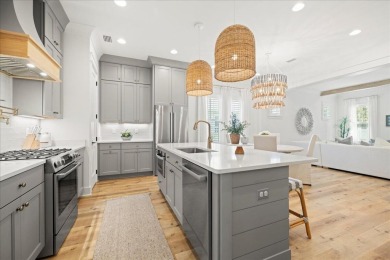 Welcome to 133 E Firethorn Circle, a coastal retreat nestled on on Origins Golf Club in Florida - for sale on GolfHomes.com, golf home, golf lot